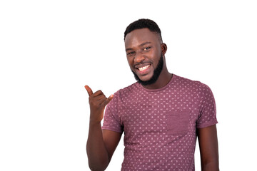 handsome young man making phone gesture with his fingers smiling.