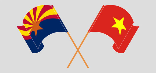 Crossed and waving flags of the State of Arizona and Vietnam