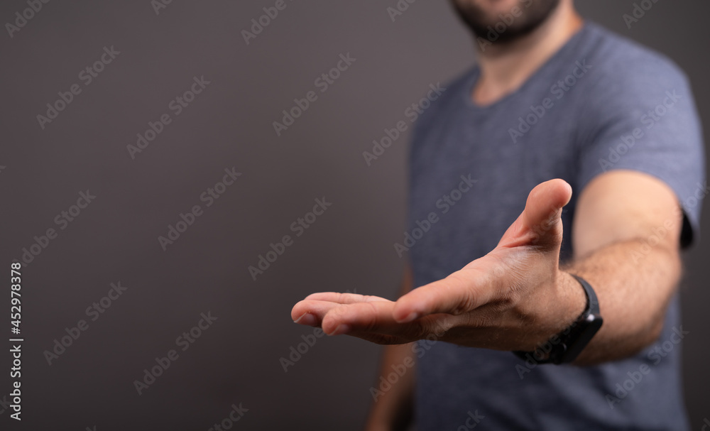 Poster man showing his empty hand.
