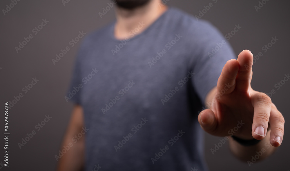 Poster businessman pointing or touching finger in screen..