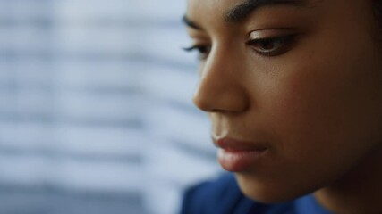 Thoughtful business woman face closeup. Serious professional thinking problem