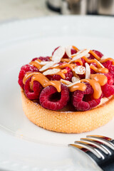 dessert tartlet with raspberries and caramel