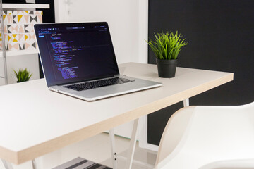 Minimalistic digital nomad home office workspace