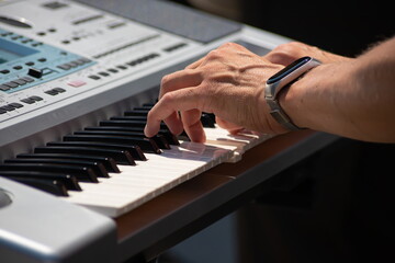 Pianist Play The Keys Of The Electronic Piano