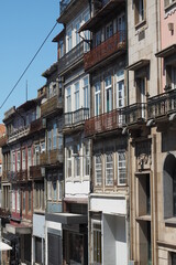 Fototapeta na wymiar Buildings in the street Rua de 31 de Janeiro 37 in Porto
