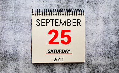 Save the Date written on a calendar - September 25