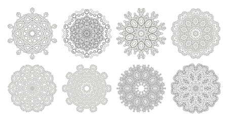 Vector monochrome set of mandalas. Decorative circular ornaments. Eight round abstract objects isolated on white background.