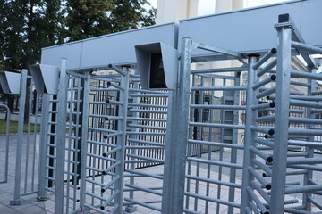 security cameras on metal gates view