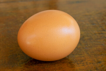 free range egg isolated on a rustic table