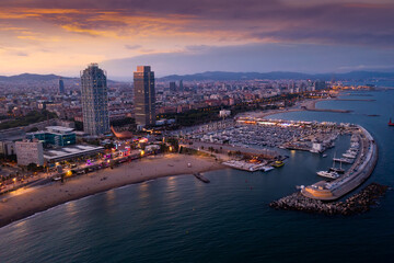 Drone view of the evening Barcelona, the capital of Catalonia, on the Mediterranean coast, Spain