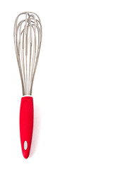 Steel manual whisk with plastic cover and red handle for pastry, isolated on white background with space for text