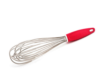 Steel manual whisk with plastic cover and red handle for pastry, isolated on white background with...