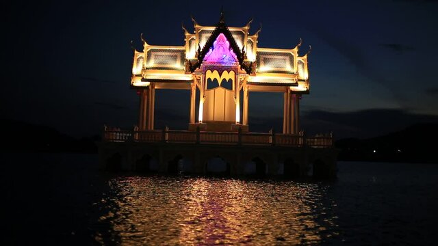 Timelapse day to night, Reflection and beautiful sunset of thai pavilion at Khao Tao reservoir in sunset, Hua Hin, Thailand