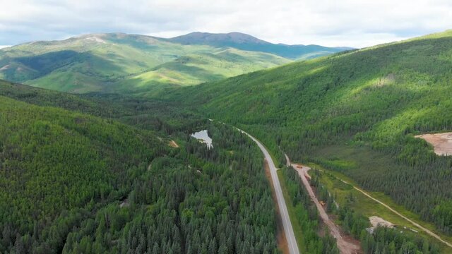 4K Drone Video (4X Speed dolly shot) of Mountains along Chena Hot Springs Road near Entrance of Resort outside Fairbanks, Alaska in Summer