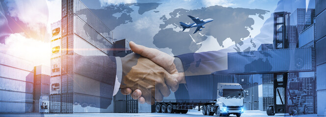 Double exposure businessman handshake best business cooparation with logistics and transportation...