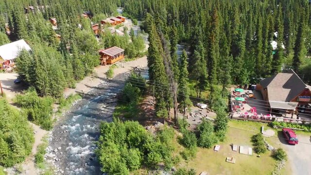 4K Drone Video of McKinley Creekside Caf� and Panorama Pizza Pub next to Carlo Creek near Denali National Park and Preserve, AK during Summer