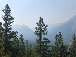 Smoky mountains in Castle Provincial Park in Alberta, Canada.  Heavy smoke from wildfires in British Columbia and the USA is seen over the Rocky Mountains in Alberta. 