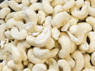 Cashew nuts top view background. 