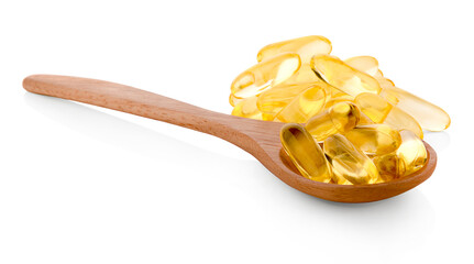 Fish oil capsules in a spoon
