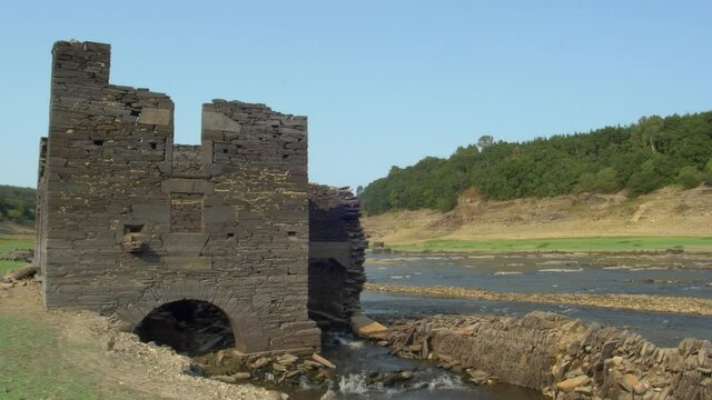 Close shot of water mill.