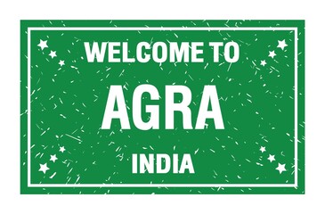 Fototapeta premium WELCOME TO AGRA - INDIA, words written on green rectangle stamp