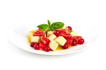 Fresh tomato and cheese salad, isolated on white background.