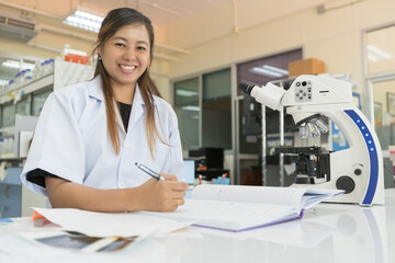 Picture of the scientist working in the laboratory and smiling, Concept science and technology, Science background