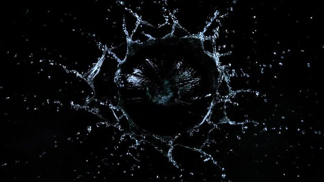 Super Slow Motion Shot of Water Splash Isolated on Black Background at 1000fps.