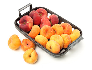 chinese flat peaches on white background 