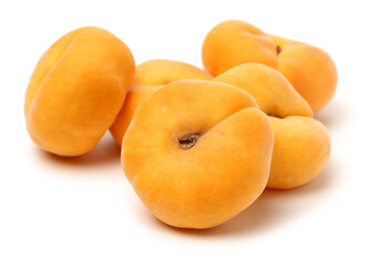 chinese flat peaches on white background 