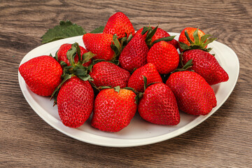 Ripe sweet strawberry with leaf