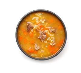Bowl with tasty beef barley soup on white background