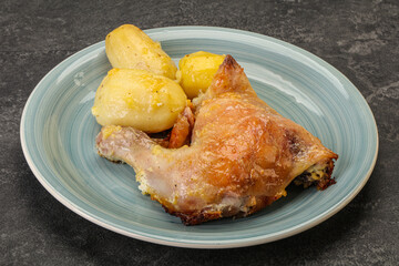 Roasted chicken leg with potato