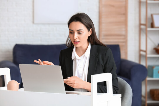 Young Woman Having Interview Online At Home