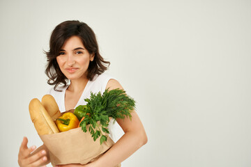 Woman in white t-shirt groceries healthy food supermarket delivery