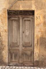 Fototapeta na wymiar Old Wooden Door in Antrodoco, Italy