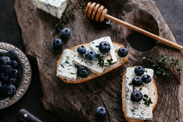 sandwiches with blueberry cheese and honey