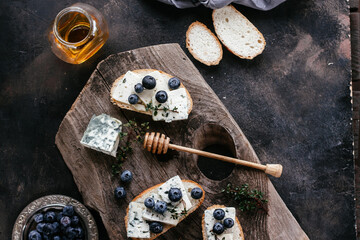 sandwiches with blueberry cheese and honey