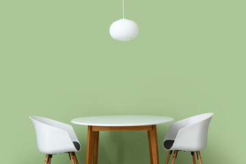 Stylish dining table near color wall