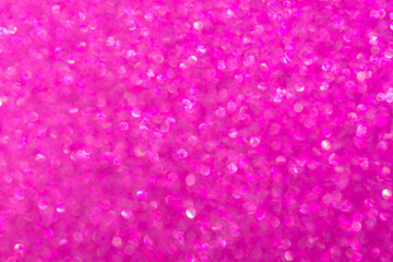 Abstract pink magenta background with unfocused bokeh. Fashionable bright shiny color of femininity, beauty. Festive pure pink layout of a postcard, a New Year banner. Valentine's Day background