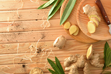 Freshly picked organic ginger root on wooden traditional cuisine