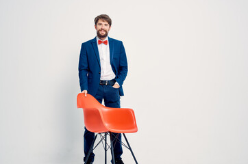 business man in suit red chair studio manager work