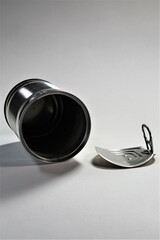 silver spoon and cup