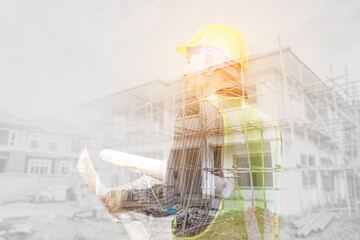 Double exposure image of professional engineer in protective helmet and blueprints paper at the...