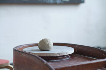studio detail of a potter's wheel with cooked clay. workshop on the creation of clay dishes.