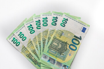 One hundred euro banknotes money, european currency on a white background.