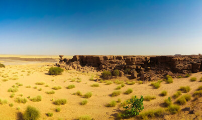Rock formation at Sahara desert near Tchirozerine region, Agadez, Niger - obrazy, fototapety, plakaty