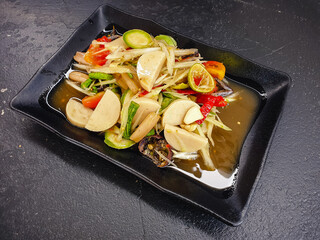 Som tam thai, thai papaya salad on table background