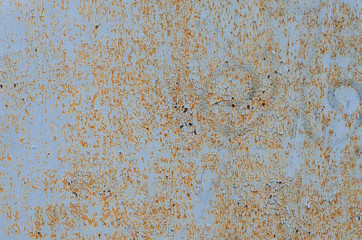 Old peeling paint. Vintage surface. Rust texture. Painted metal. Vintage background.