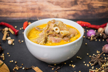 Mutton Curry on bowl and spices. One of the aqiqah menus
